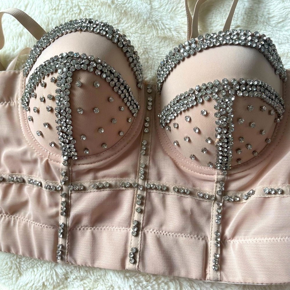Stone encrusted boostier-blush color. Non-slip. .Wear alone or under sheer top.